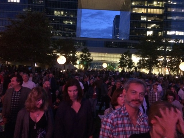 Fans flood the lawn of Century City Park